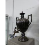 A SILVER PLATED TEA URN.