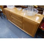 AN ERCOL PALE ELM SIDEBOARD.