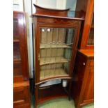 AN EDWARDIAN INLAID MAHOGANY AND LEAD GLAZED DISPLAY CABINET.