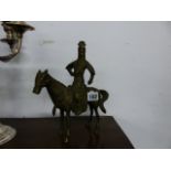 AN ORIENTAL BRONZE FIGURE ON HORSEBACK.