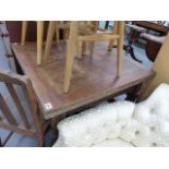 AN OAK DRAW LEAF TABLE.