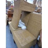 A SET OF FOUR RATTAN CHAIRS.