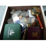 A BOX OF COINS.