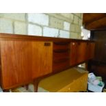 A RETRO SIDEBOARD TOGETHER WITH A MODERN SIDEBOARD.