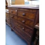 A VICTORIAN MAHOGANY CHEST OF DRAWERS.