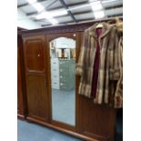 A LARGE EDWARDIAN MAHOGANY WARDROBE.