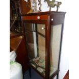 AN EDWARDIAN DISPLAY CABINET.