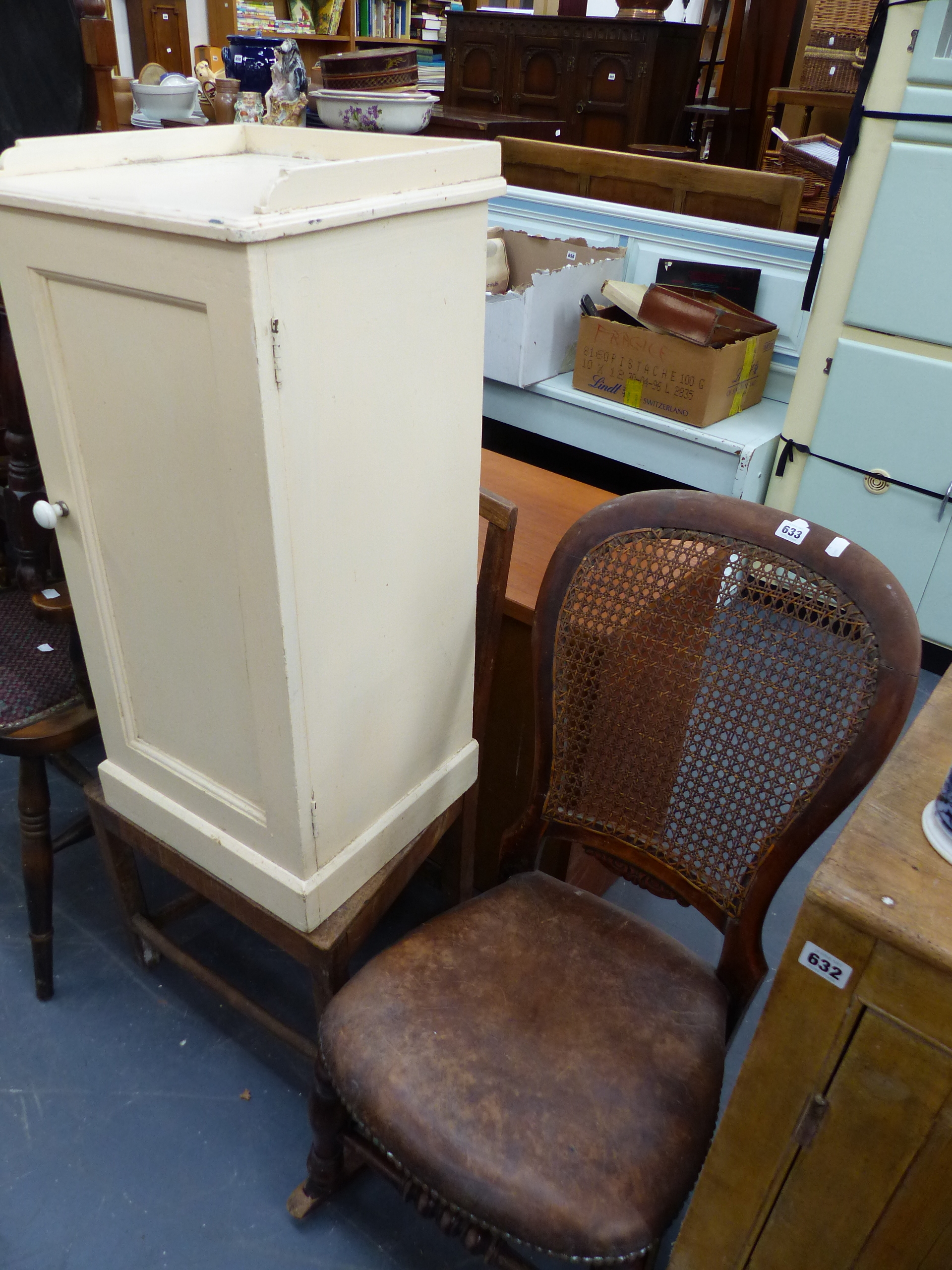 A ROCKING CHAIR, BEDSIDE CABINET AND A SMALL ELM CHAIR.