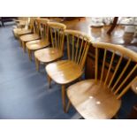 FIVE ERCOL SIDE CHAIRS , AN ERCOL ARMCHAIR AND A SIDE CHAIR.