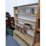 A RUSTIC PINE BOOKCASE.