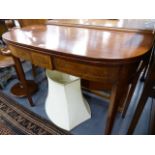 A REGENCY MAHOGANY FOLD OVER TEA TABLE.