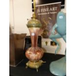 A VICTORIAN POTTERY AND BRASS LAMP.