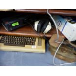 A COMMODORE 64 COMPUTER, VARIOUS BOOKS,ETC.