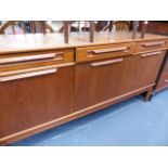 A RETRO TEAK SIDEBOARD.