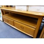 AN ERCOL LOW SIDE CABINET.