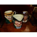 TWO DOULTON AND A BESWICK CHARACTER JUG.