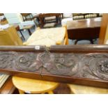 A LARGE CARVED OAK CORNICE.