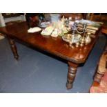 A VICTORIAN DINING TABLE.