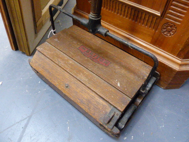 A VINTAGE BRITON CARPET SWEEPER.