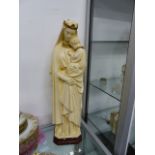 A VINTAGE PLASTER FIGURE OF THE MADONNA AND CHILD. H.62cms.