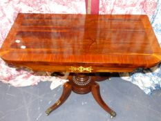 A FINE REGENCY CROSSBANDED ROSEWOOD AND BRASS INLAID FOLD OVER CARD TABLE ON TURNED COLUMN AND