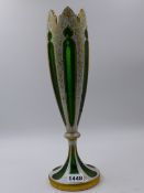 A LATE 19th.C. BOHEMIAN GREEN OVERLAID GLASS VASE OF TAPERED FORM. H.34cms.