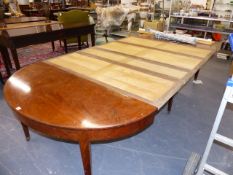 A LARGE CONTINENTAL MAHOGANY EXTENDING DINING TABLE WITH PANELLED EXTENDING LEAVES. W.147 x H.