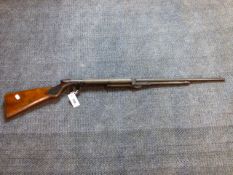 A BSA TYPE UNDER LEVER AIR RIFLE IN .22 CALIBRE.