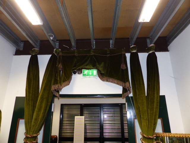 TWO PAIRS OF BESPOKE OLIVE GREEN VELVET LINED AND INTERLINED DRAPES/CURTAINS WITH ASSOCIATED