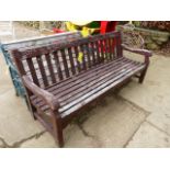 A LARGE TEAK GARDEN BENCH. c.1958