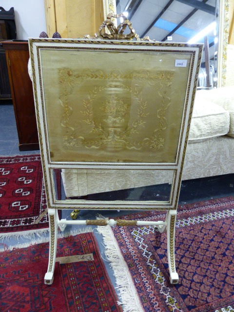 A 19th.C.FIRESCREEN WITH INSET SILK PANEL, THE FRAME WITH GILT AND WHITE PAINT DECORATION TOGETHER