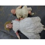 AN ARMAND MARSEILLE 370 BISQUE HEAD DOLL No.51/5 TOGETHER WITH AN S.F.B.J. 336 DOLL. (2)