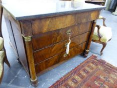 A FRENCH MAHOGANY ORMOLU MOUNTED MARBLE TOP EMPIRE STYLE COMMODE WITH FOUR LONG DRAWERS. H.89cms W.