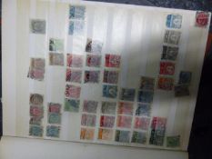 A COLLECTION OF WORLD STAMPS IN ALBUMS AND FOUR STOCK BOOKS.