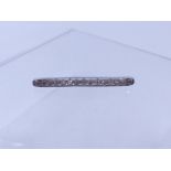A FRENCH PLATINUM DIAMOND BAR BROOCH, WITH A DOGS HEAD HALLMARK DENOTING ITEMS MADE IN FRANCE FOR