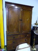 AN EARLY VICTORIAN MAHOGANY AND EBONY STRUNG LINEN PRESS FITTED WITH SLIDES OVER TWO SHORT AND TWO