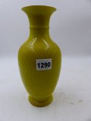 A CHINESE YELLOW GROUND BALUSTER VASE WITH INCISED DECORATION. H.22cms.