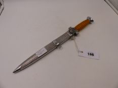 A THIRD REICH DRK LEADER'S DAGGER WITH PLATED BLADE, PLATED SCABBARD AND HILT.