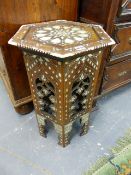 A GOOD ANTIQUE MOORISH OCTAGONAL OCCASIONAL TABLE WITH PIERCED AND MOTHER OF PEARL DECORATION.