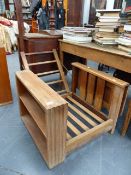 AN UNUSUAL ART DECO LIMED OAK RECLINING ARMCHAIR WITH INTEGRAL DROP LEAF WRITING SURFACE AND