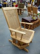 A PAIR OF UNUSUAL TEAK ROCKING VERANDAH ARMCHAIRS.