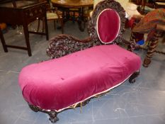 AN IMPRESSIVE CARVED VICTORIAN SIX PIECE SALON SUITE. THE FRAMES WITH ELABORATE PIERCED FRUIT AND
