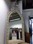 AN IMPRESSIVE CARVED LIMED OAK GOTHIC REVIVAL PIER MIRROR. H.232 x W.106cms.