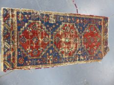 AN ANTIQUE CAUCASIAN RUG. 270 x 119cms AND AN ANTIQUE CAUCASIAN FRAGMENT.