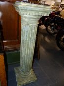 A PAIR OF CARVED AND PAINTED COLUMN FORM PEDESTALS WITH MARBLE TOPS. H.115cms.