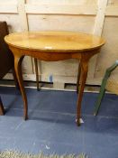 A 19th.C.SATINWOOD AND CROSSBANDED OVAL CENTRE TABLE ON SLENDER CABRIOLE LEGS. W.76cms.