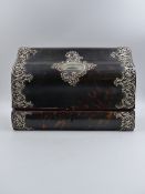 A SILVER MOUNTED TORTOISESHELL STATIONARY BOX WITH A RED SATIN LINER. DATED 1903, LONDON.