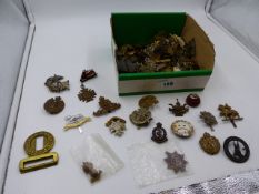 ONE BOX OF VARIOUS CAP BADGE INSIGNIA, THE WELSH, ANSON, SUFFOLK, YORKSHIRE, BRITISH COLUMBIA