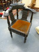 A 19th.C.CARVED OAK ARMCHAIR WITH NAUTICAL ANCHOR DECORATIONS.