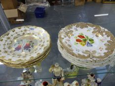 A PAIR OF 19th.C.BOTANICAL PLATES WITH GILDED BORDERS. Dia.23cms A SIMILAR CONTINENTAL PAIR OF